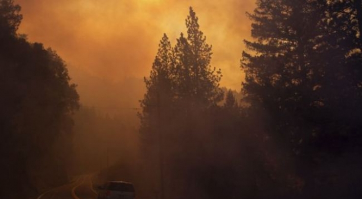 Hearses stand by as crews search for California fire victims