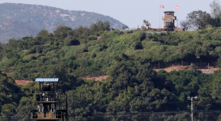 Koreas verify DMZ guard post pullout