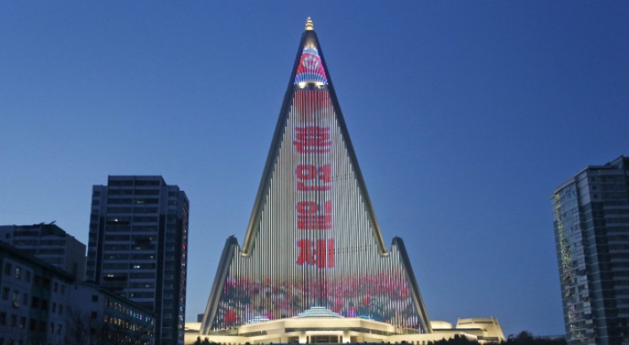 World's tallest empty hotel lit up with N. Korean propaganda