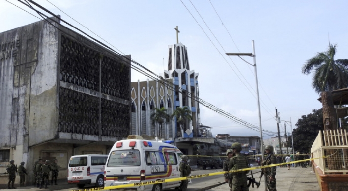 20 dead as bombs target Sunday Mass in Philippine cathedral