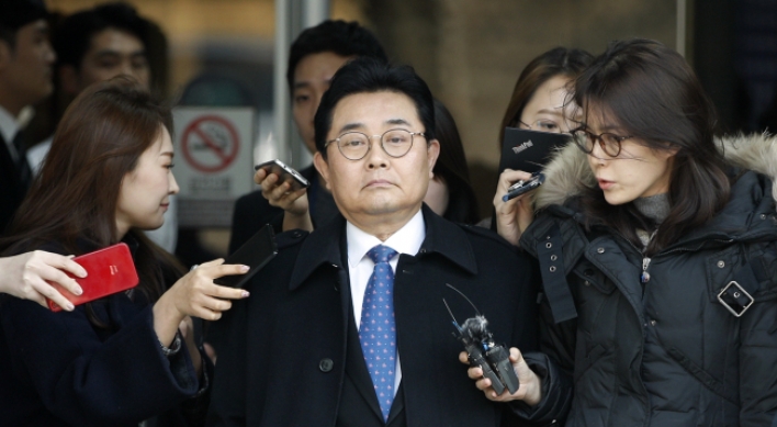 Ex-Moon aide handed 6-year jail term for graft, avoids being arrested