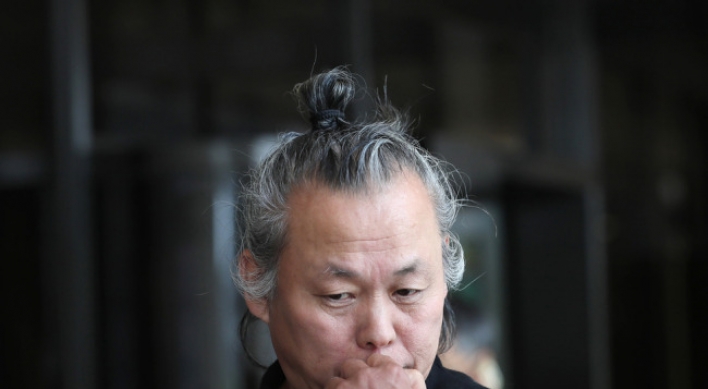 Director Kim Ki-duk lodges w1b damages suit against actress, broadcaster