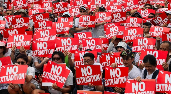 Violence mars end of huge Hong Kong protest against China extradition