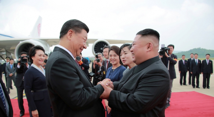 Kim, Xi agree to strengthen ties for regional peace, stability: KCNA