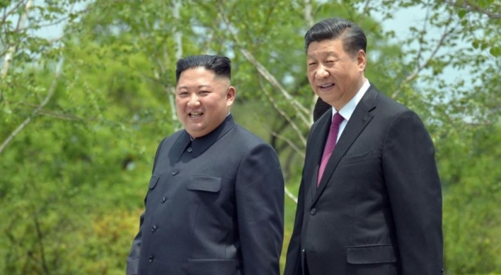 Kim, Xi reach consensus on 'important issues' through series of summits: KCNA