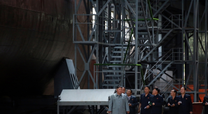 NK leader inspects new submarine to be deployed in East Sea: state media