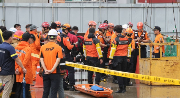 Heavy downpour kills one at construction site