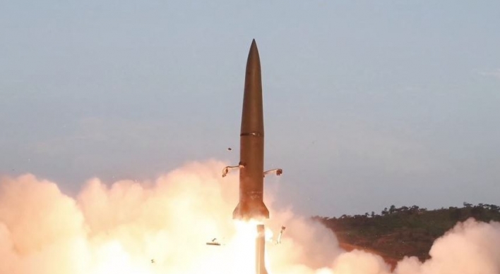 NK test-fired new rocket system under leader's supervision: state media