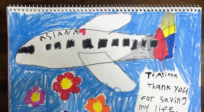 Asiana Airlines makes emergency landing to save 8-year-old passenger