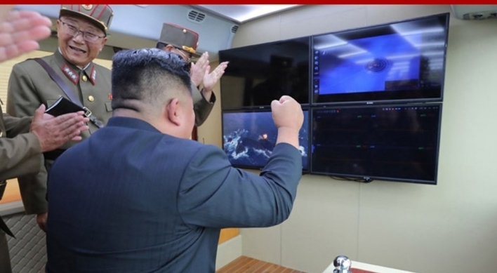 N. Korea says it tested 'new weapon' under leader Kim's guidance