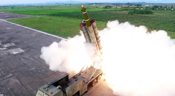 N. Korea says it tested new super-large multiple rocket launcher