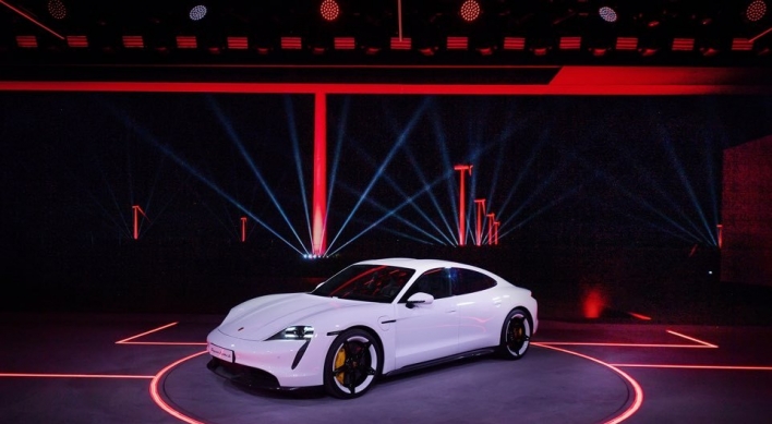 Porsche unveils first-ever electric sports car Taycan