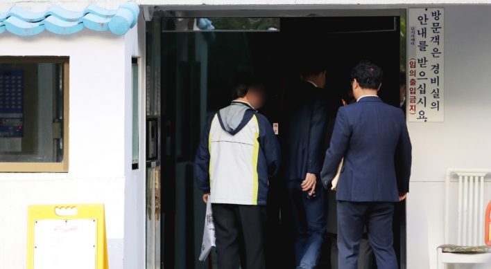 Prosecution raids justice minister's house over corruption scandal