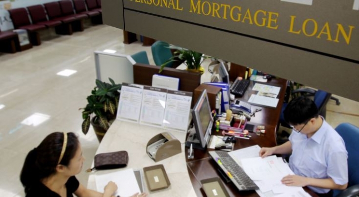 [News Focus] Real estate mortgages hinder economic growth