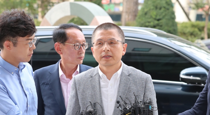 Opposition leader appears at prosecution office over 'fast-track' bills row