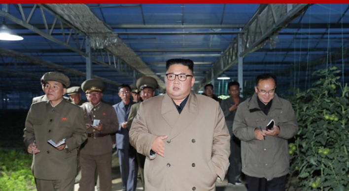 North Korean leader visits farm, calls for stable food supply