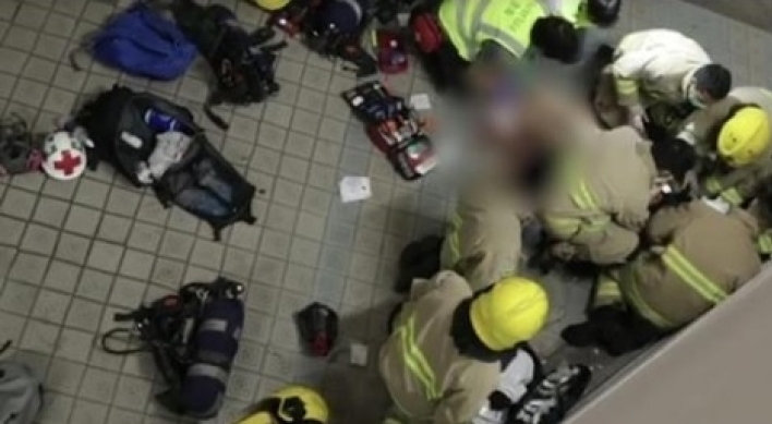 Hong Kong student who fell during protest clashes dies