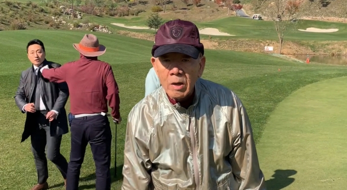 Video of former President Chun playing golf sparks uproar