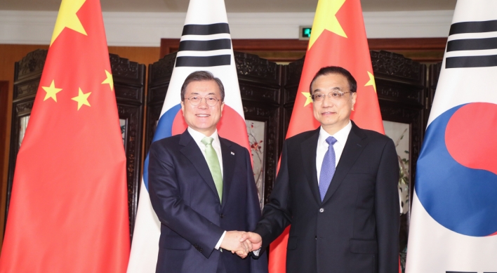 Moon, Li agree to facilitate follow-up FTA talks on service, investment sectors