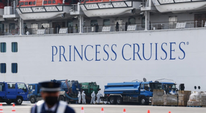 Japan to begin moving some off quarantined cruise ship