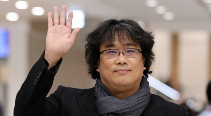 Oscar-winning director Bong Joon-ho returns home to hero's welcome