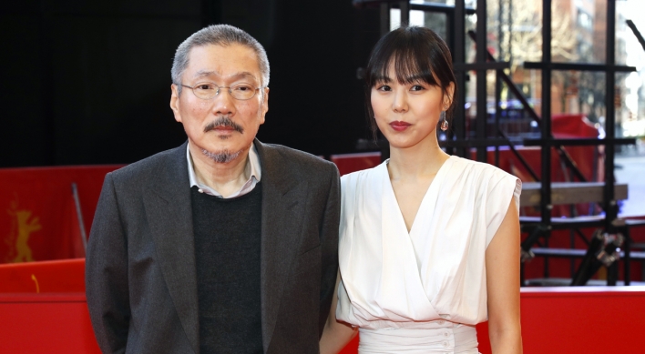 Hong Sang-soo wins best director at Berlin film fest for 'The Woman Who Ran'