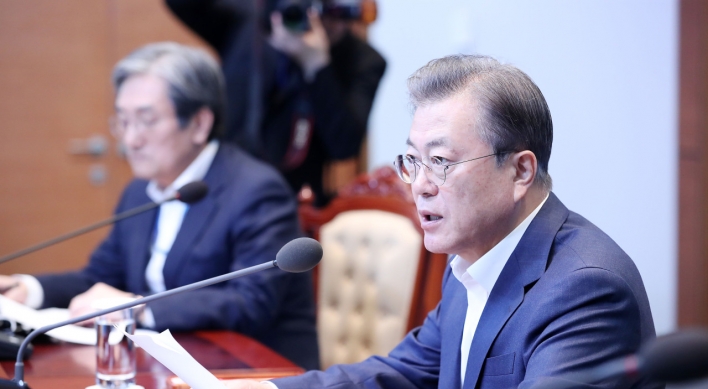 Moon says new infections slowing, but advises caution over excessive optimism