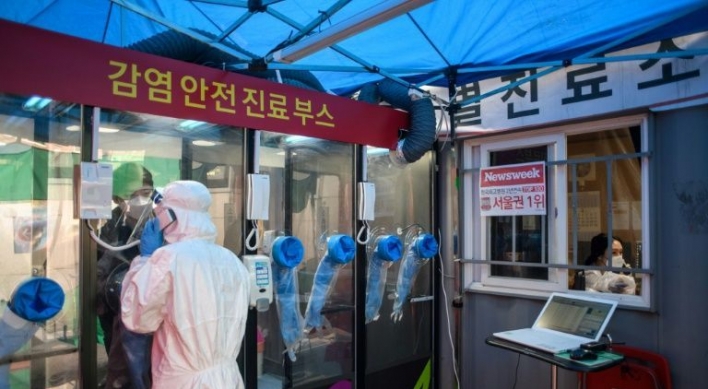 S. Korea dials up virus testing with hospital 'phone booths'