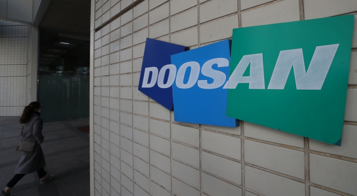 Doosan Group execs to forgo 30% of their wages