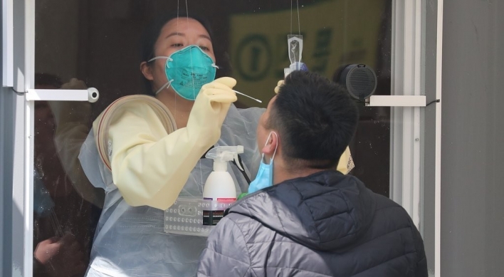 Walkthrough virus screening center for intl. arrivals opens at Seoul sports complex