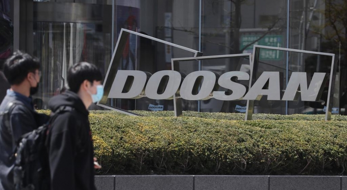 Doosan to sell off full 61% stake in Doosan Solus