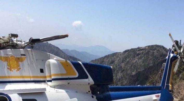 Firefighting helicopter with 7 aboard crashes