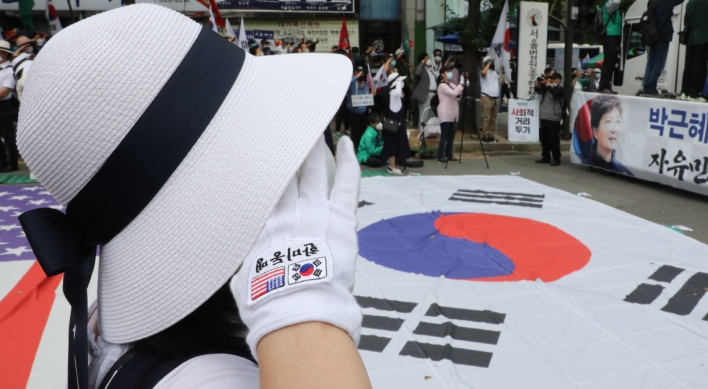 S. Korea court slashes ex-president's jail term by 10 years