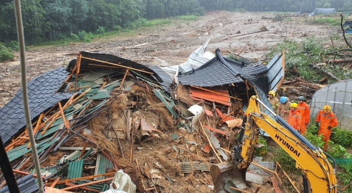 Thousands evacuate as heavy rains trigger flood, landslides