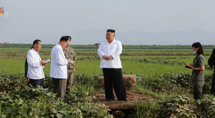 NK leader's reserve grain arrives at flood-hit village to help victims