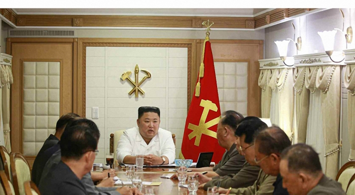 NK leader holds party meeting during visit to typhoon-hit area