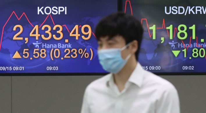 Seoul stocks open tad higher on brisk M&As, vaccine hopes