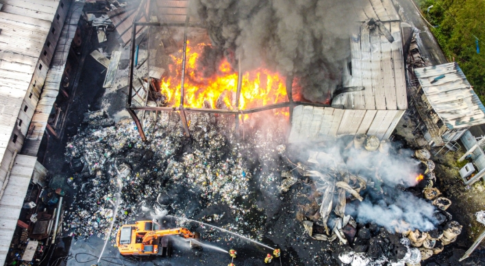 [Newsmaker] 2 killed in fire at waste recycling facility