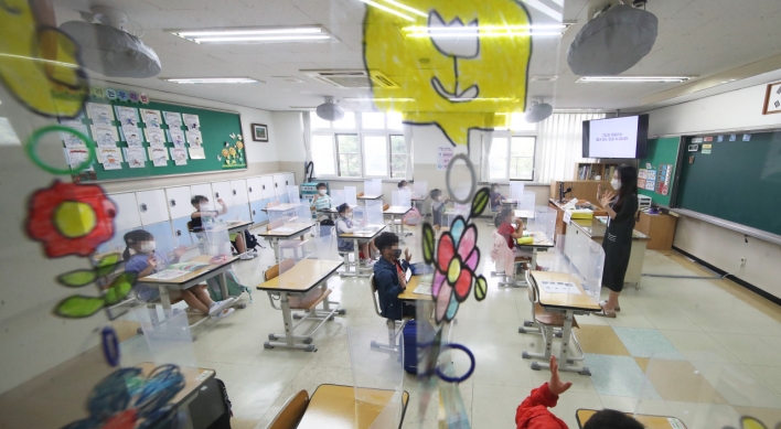 Students in greater Seoul return to school as virus slows, learning gap widens