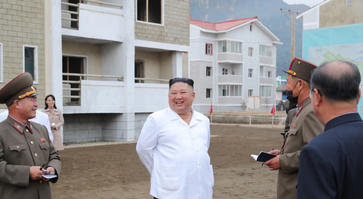 NK leader inspects flood recovery efforts together with sister