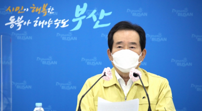 Prime minister calls for all-out efforts to contain latest Busan outbreak