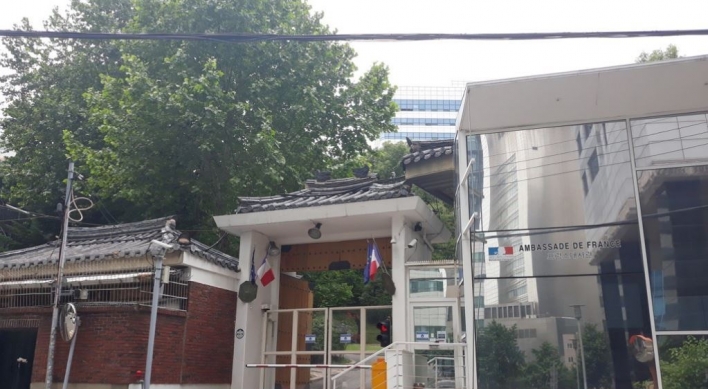 Police detain one of two men suspected of threatening French envoy in Seoul