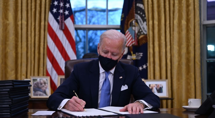 Two Koreas look toward new relationship with Biden