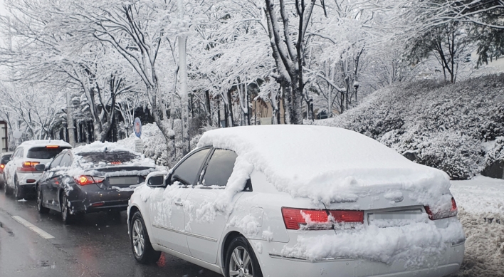 One killed, dozens injured in traffic accidents amid heavy snow