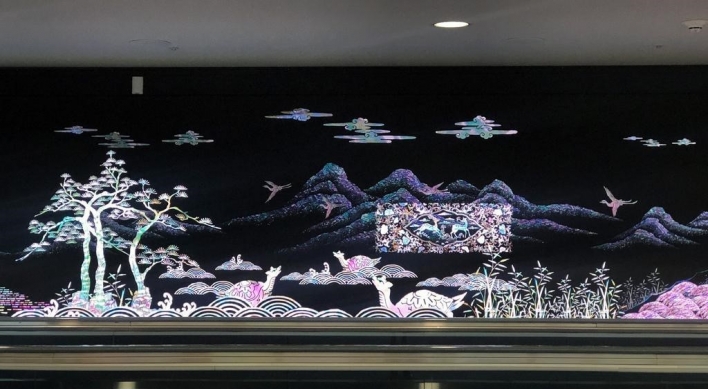 Media artwork with traditional Korean themes greet arrivals at Incheon Airport