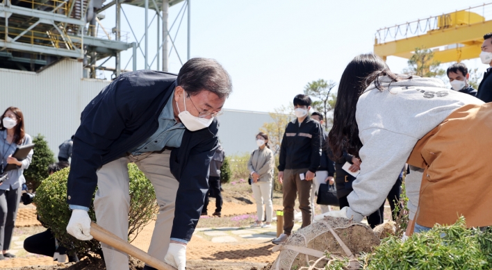 Moon attends tree-planting day event at historic power plant site