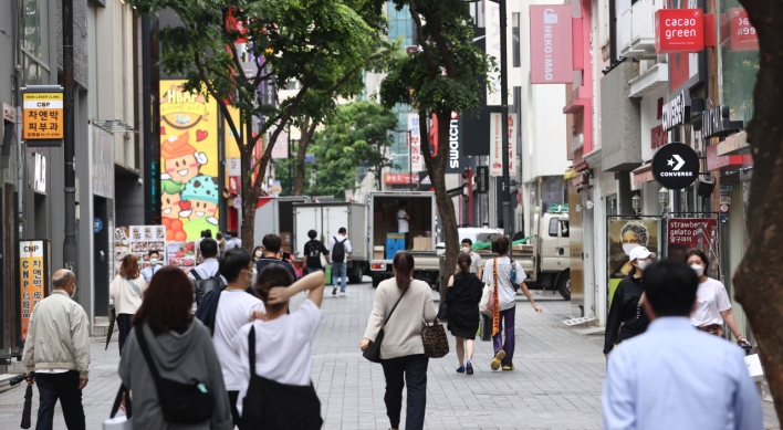 Koreans can ditch masks outdoors after first COVID-19 shot