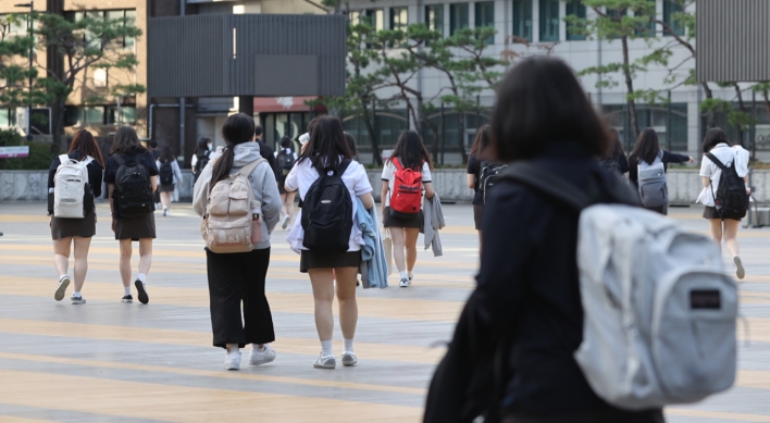 School children return to classrooms from summer vacations in middle of raging pandemic