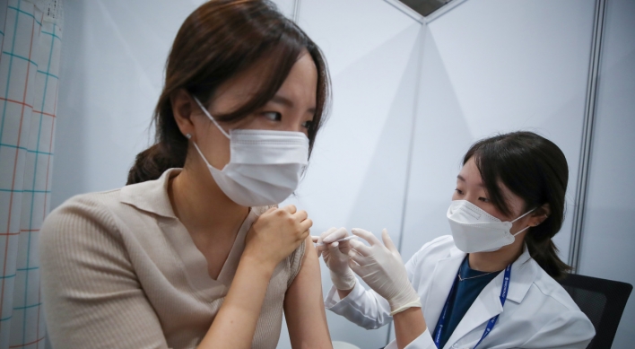 Moon says vaccinations 'faster than expected' as half of population gets first shots