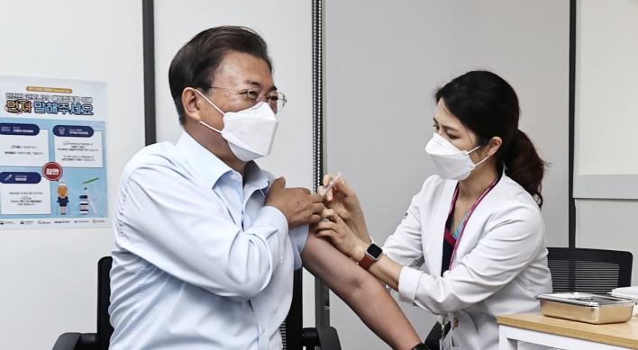 President Moon, first lady receive COVID-19 booster shots